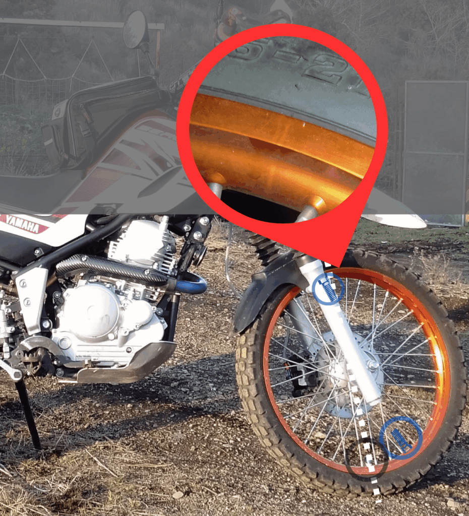 セロー250フロントリムへのビードストッパー穴あけ位置(バルブ対角線上・スポークとリム溶接箇所を避ける位置)の拡大説明図